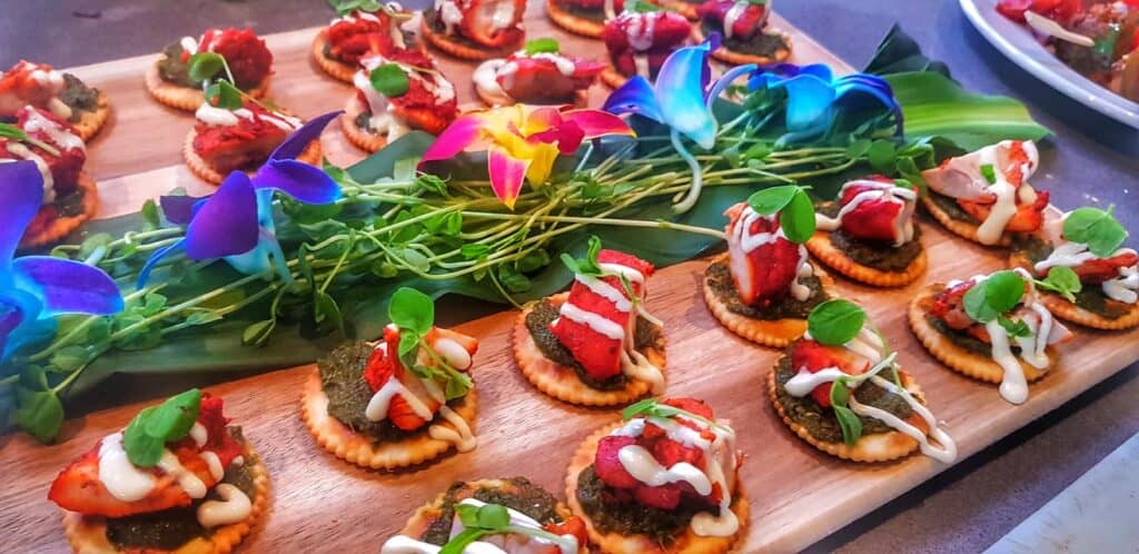 A vibrant buffet spread of colourful Indian dishes at a birthday party. A vibrant buffet spread of colourful Indian dishes at a birthday party.